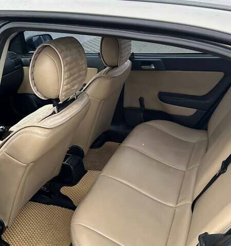 Серый Опель Астра, объемом двигателя 1.6 л и пробегом 179 тыс. км за 4000 $, фото 32 на Automoto.ua