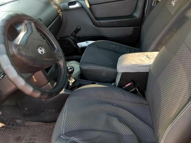 Серый Опель Астра, объемом двигателя 1.4 л и пробегом 235 тыс. км за 2750 $, фото 4 на Automoto.ua