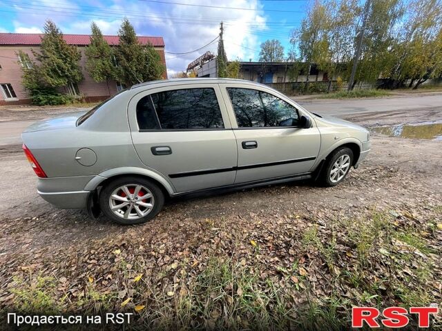 Серый Опель Астра, объемом двигателя 1.4 л и пробегом 326 тыс. км за 4200 $, фото 2 на Automoto.ua