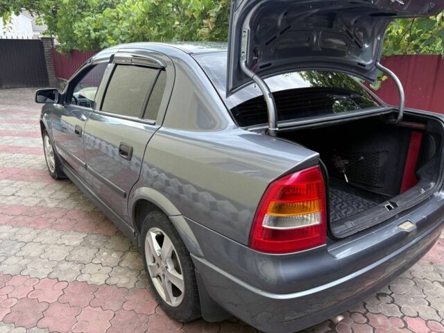 Серый Опель Астра, объемом двигателя 1.4 л и пробегом 201 тыс. км за 3300 $, фото 3 на Automoto.ua