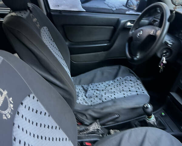 Сірий Опель Астра, об'ємом двигуна 1.4 л та пробігом 236 тис. км за 3500 $, фото 7 на Automoto.ua