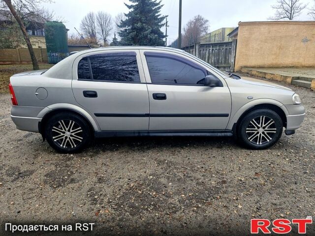 Серый Опель Астра, объемом двигателя 1.4 л и пробегом 183 тыс. км за 4200 $, фото 5 на Automoto.ua