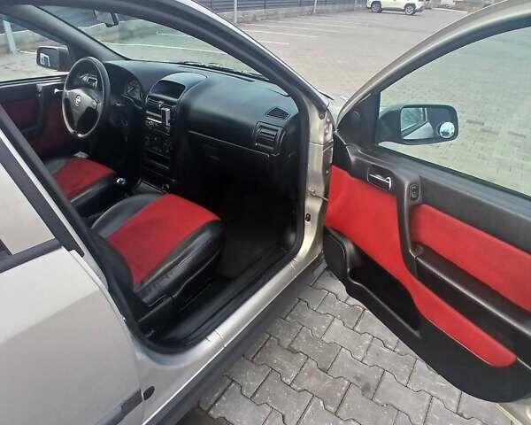 Серый Опель Астра, объемом двигателя 1.6 л и пробегом 98 тыс. км за 4500 $, фото 20 на Automoto.ua