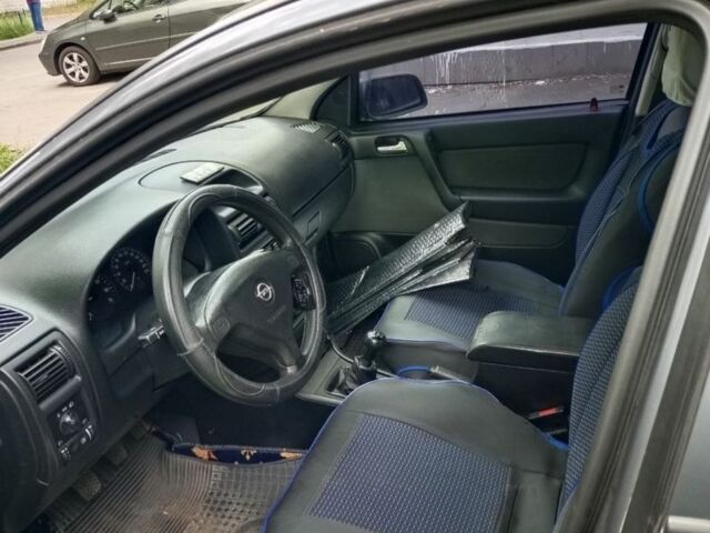 Серый Опель Астра, объемом двигателя 1.6 л и пробегом 180 тыс. км за 5000 $, фото 7 на Automoto.ua