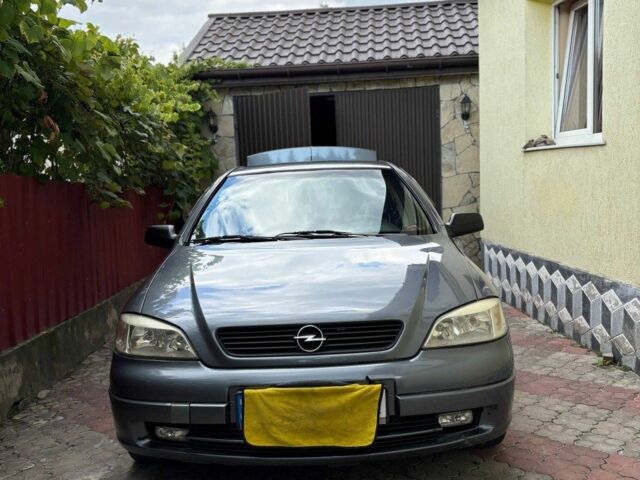 Серый Опель Астра, объемом двигателя 1.4 л и пробегом 201 тыс. км за 3600 $, фото 1 на Automoto.ua