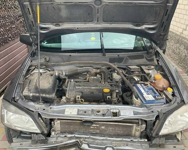 Серый Опель Астра, объемом двигателя 1.4 л и пробегом 122 тыс. км за 1500 $, фото 29 на Automoto.ua