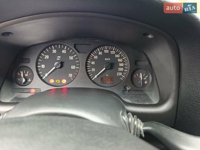 Серый Опель Астра, объемом двигателя 1.4 л и пробегом 77 тыс. км за 4400 $, фото 10 на Automoto.ua