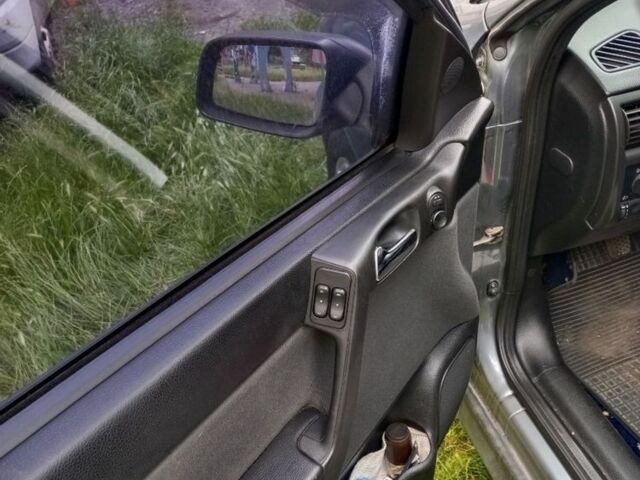 Серый Опель Астра, объемом двигателя 1.6 л и пробегом 180 тыс. км за 5000 $, фото 4 на Automoto.ua