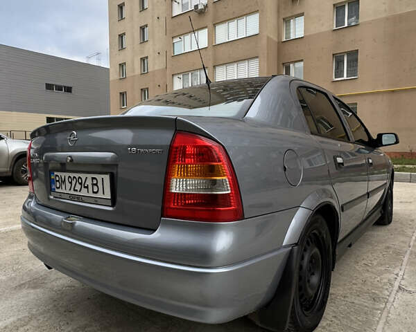 Серый Опель Астра, объемом двигателя 1.6 л и пробегом 113 тыс. км за 5500 $, фото 3 на Automoto.ua