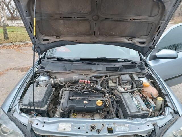 Серый Опель Астра, объемом двигателя 1 л и пробегом 400 тыс. км за 3500 $, фото 10 на Automoto.ua