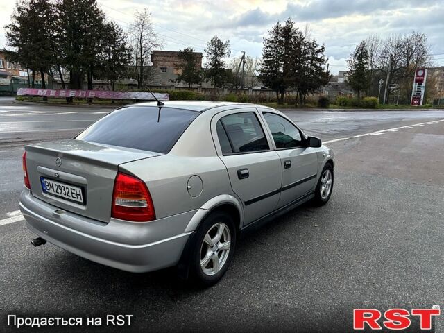 Серый Опель Астра, объемом двигателя 1.4 л и пробегом 201 тыс. км за 3450 $, фото 5 на Automoto.ua