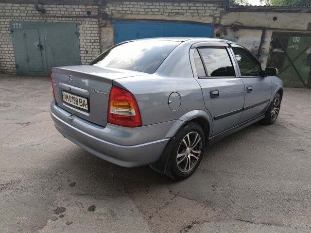 Серый Опель Астра, объемом двигателя 1.4 л и пробегом 73 тыс. км за 5200 $, фото 3 на Automoto.ua