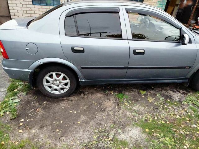 Серый Опель Астра, объемом двигателя 1.6 л и пробегом 256 тыс. км за 3500 $, фото 7 на Automoto.ua