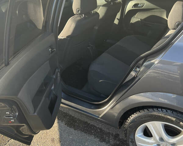 Серый Опель Астра, объемом двигателя 1.25 л и пробегом 234 тыс. км за 4999 $, фото 5 на Automoto.ua