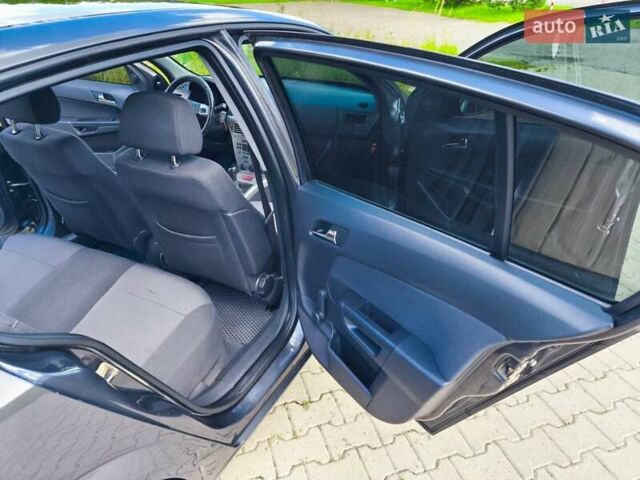 Серый Опель Астра, объемом двигателя 1.7 л и пробегом 340 тыс. км за 5500 $, фото 16 на Automoto.ua