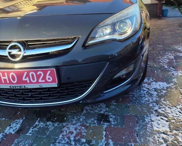 Серый Опель Астра, объемом двигателя 1.4 л и пробегом 208 тыс. км за 9300 $, фото 2 на Automoto.ua