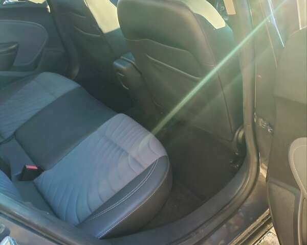 Серый Опель Астра, объемом двигателя 1.4 л и пробегом 208 тыс. км за 9300 $, фото 13 на Automoto.ua