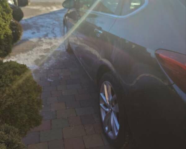 Серый Опель Астра, объемом двигателя 1.4 л и пробегом 208 тыс. км за 9300 $, фото 8 на Automoto.ua