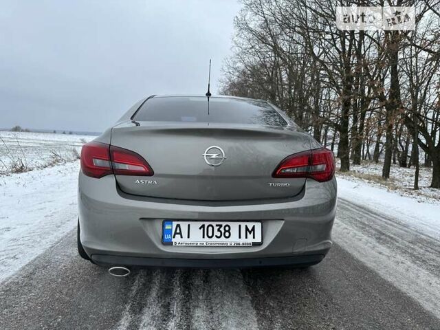 Сірий Опель Астра, об'ємом двигуна 1.4 л та пробігом 38 тис. км за 13000 $, фото 3 на Automoto.ua