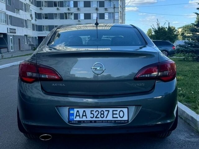 Сірий Опель Астра, об'ємом двигуна 1.36 л та пробігом 118 тис. км за 10499 $, фото 2 на Automoto.ua