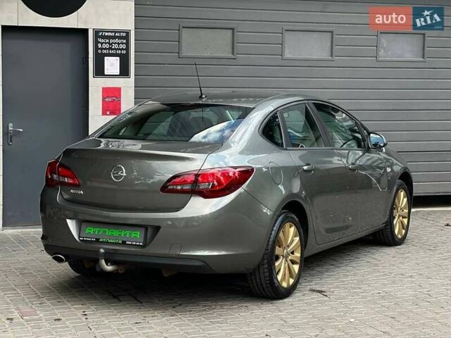Серый Опель Астра, объемом двигателя 1.4 л и пробегом 92 тыс. км за 11900 $, фото 5 на Automoto.ua