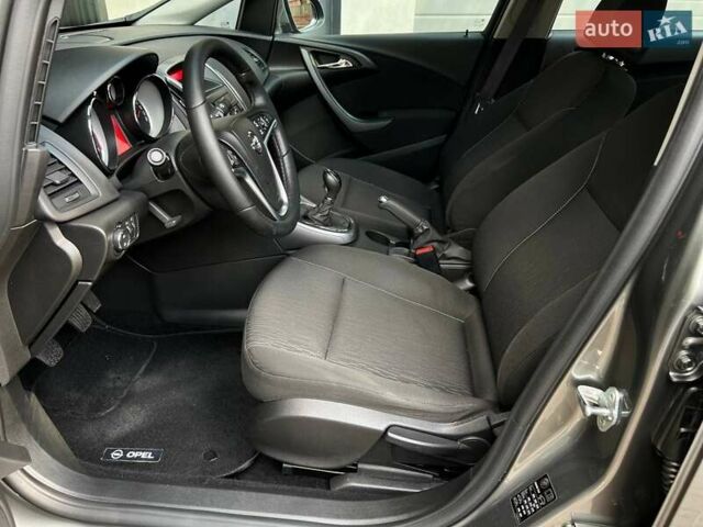 Серый Опель Астра, объемом двигателя 1.4 л и пробегом 92 тыс. км за 11900 $, фото 10 на Automoto.ua