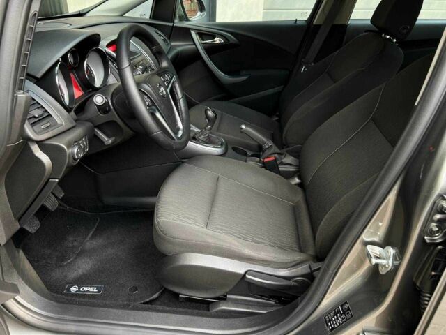 Серый Опель Астра, объемом двигателя 1.4 л и пробегом 92 тыс. км за 11500 $, фото 10 на Automoto.ua