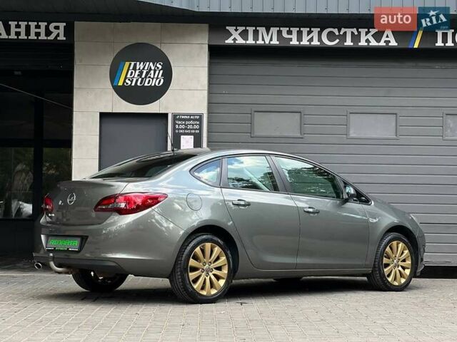 Серый Опель Астра, объемом двигателя 1.4 л и пробегом 92 тыс. км за 11900 $, фото 6 на Automoto.ua