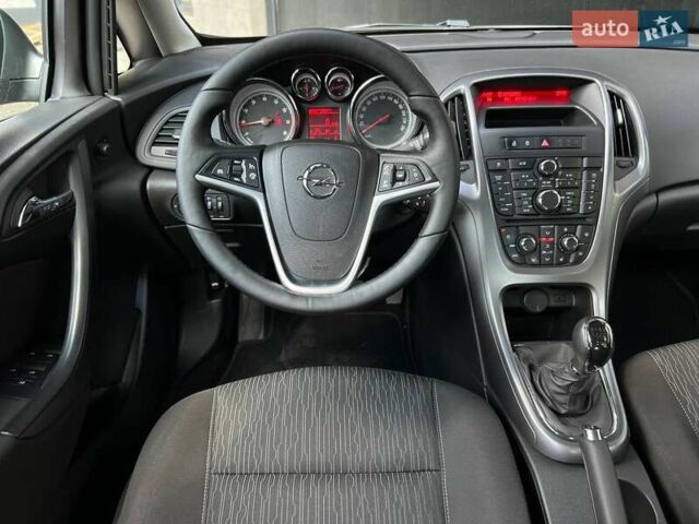 Серый Опель Астра, объемом двигателя 1.4 л и пробегом 92 тыс. км за 11900 $, фото 14 на Automoto.ua