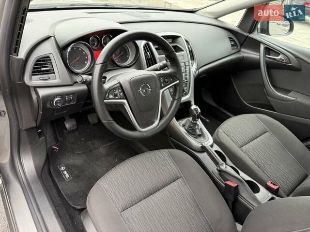 Серый Опель Астра, объемом двигателя 1.4 л и пробегом 92 тыс. км за 10999 $, фото 9 на Automoto.ua