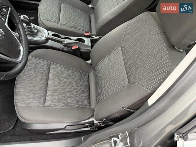 Серый Опель Астра, объемом двигателя 1.4 л и пробегом 92 тыс. км за 10999 $, фото 12 на Automoto.ua