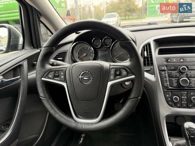 Серый Опель Астра, объемом двигателя 1.4 л и пробегом 92 тыс. км за 10999 $, фото 25 на Automoto.ua