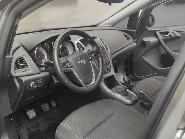 Серый Опель Астра, объемом двигателя 1.4 л и пробегом 15 тыс. км за 13100 $, фото 5 на Automoto.ua