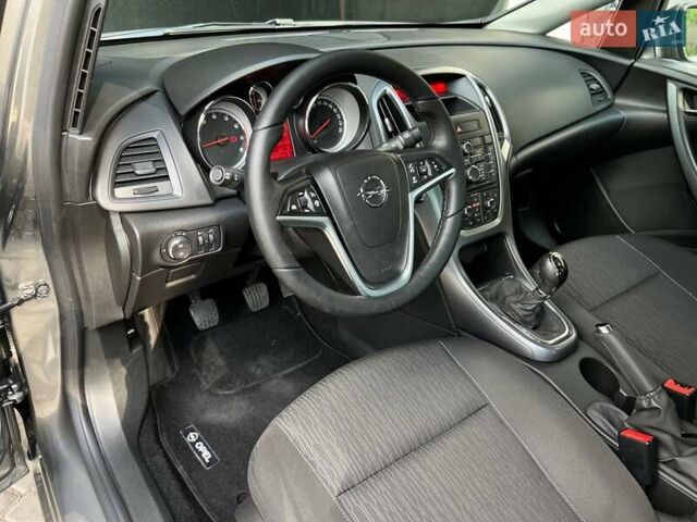 Серый Опель Астра, объемом двигателя 1.4 л и пробегом 92 тыс. км за 11900 $, фото 11 на Automoto.ua