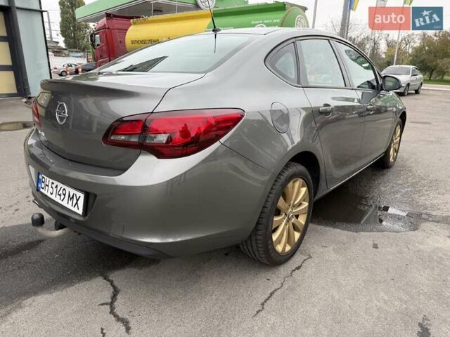 Серый Опель Астра, объемом двигателя 1.4 л и пробегом 92 тыс. км за 10999 $, фото 4 на Automoto.ua
