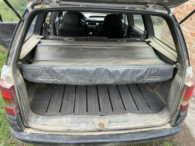 Серый Опель Астра, объемом двигателя 1.4 л и пробегом 350 тыс. км за 1200 $, фото 7 на Automoto.ua