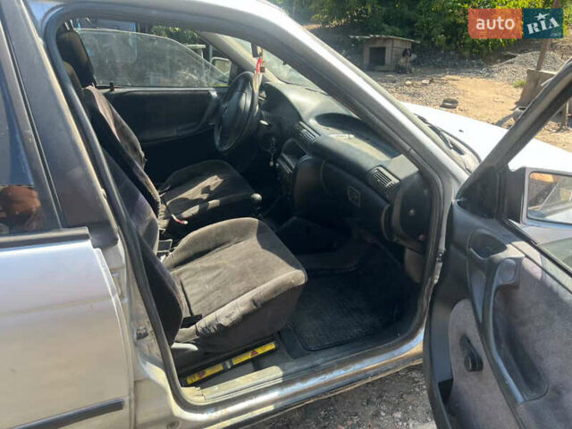 Серый Опель Астра, объемом двигателя 1.6 л и пробегом 100 тыс. км за 1100 $, фото 4 на Automoto.ua