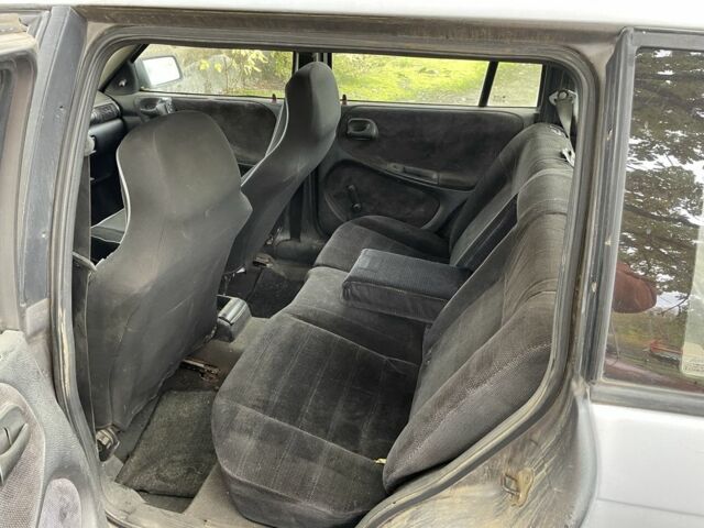 Серый Опель Астра, объемом двигателя 1.4 л и пробегом 350 тыс. км за 1200 $, фото 9 на Automoto.ua