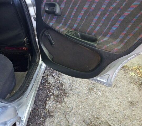 Серый Опель Астра, объемом двигателя 1.4 л и пробегом 39 тыс. км за 1400 $, фото 18 на Automoto.ua