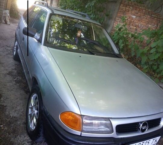 Серый Опель Астра, объемом двигателя 1.4 л и пробегом 39 тыс. км за 1400 $, фото 15 на Automoto.ua