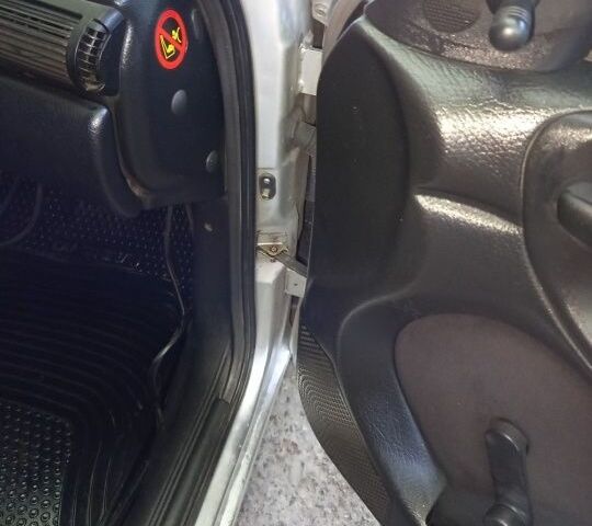 Серый Опель Астра, объемом двигателя 1.4 л и пробегом 39 тыс. км за 1400 $, фото 16 на Automoto.ua