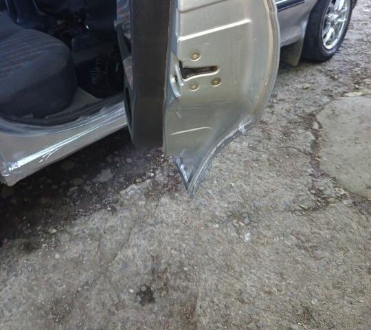 Серый Опель Астра, объемом двигателя 1.4 л и пробегом 39 тыс. км за 1400 $, фото 20 на Automoto.ua