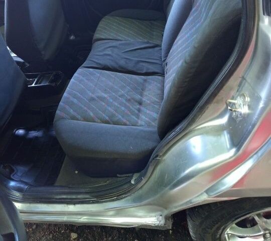 Серый Опель Астра, объемом двигателя 1.4 л и пробегом 39 тыс. км за 1400 $, фото 4 на Automoto.ua