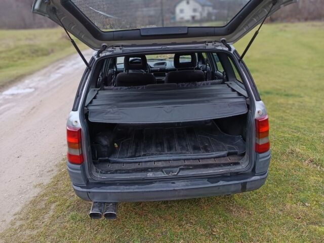 Серый Опель Астра, объемом двигателя 1.6 л и пробегом 290 тыс. км за 1184 $, фото 9 на Automoto.ua