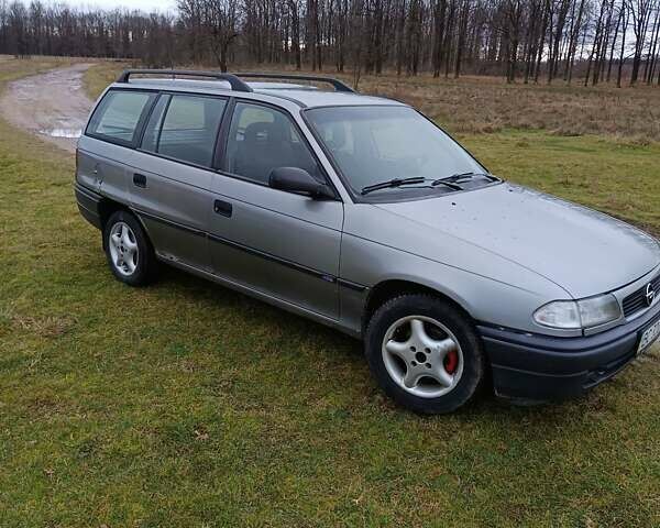 Серый Опель Астра, объемом двигателя 1.6 л и пробегом 290 тыс. км за 1200 $, фото 7 на Automoto.ua