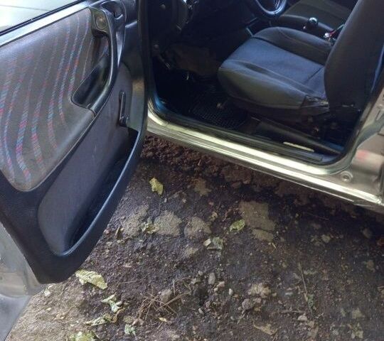 Серый Опель Астра, объемом двигателя 1.4 л и пробегом 39 тыс. км за 1400 $, фото 14 на Automoto.ua