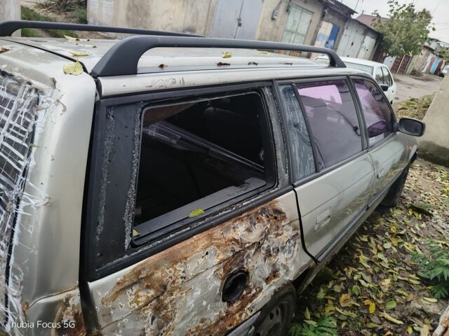 Серый Опель Астра, объемом двигателя 2 л и пробегом 3 тыс. км за 800 $, фото 3 на Automoto.ua