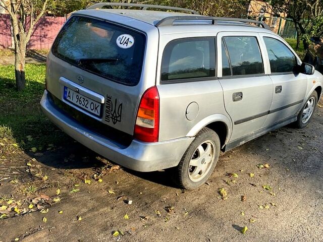 Серый Опель Астра, объемом двигателя 1.6 л и пробегом 316 тыс. км за 1800 $, фото 4 на Automoto.ua