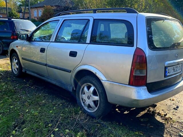 Серый Опель Астра, объемом двигателя 1.6 л и пробегом 316 тыс. км за 1800 $, фото 2 на Automoto.ua