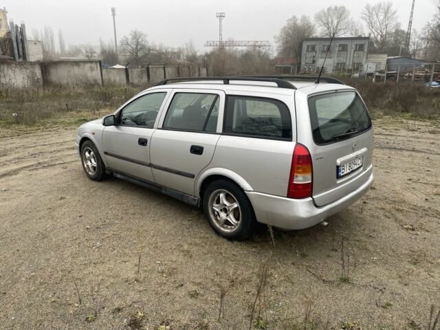 Серый Опель Астра, объемом двигателя 1.4 л и пробегом 250 тыс. км за 1900 $, фото 2 на Automoto.ua